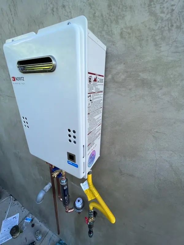 Tankless water heater installation for Brown Arrow homes